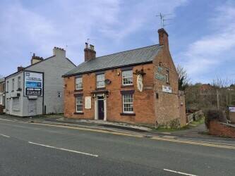 WREXHAM COUNTY BOROUGH - COMMUNITY PUBLIC HOUSE LOCATED ON BUSY MAIN ROAD