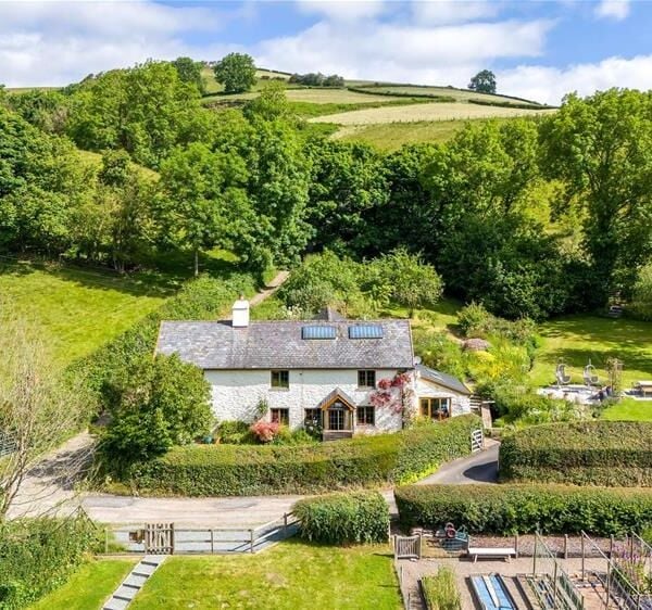 Three luxury glamping cabins with a four-bedroom detached cottage included with the sale - Mardu, Clun Photo 1