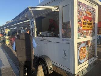 Food trailer selling Indian snacks 