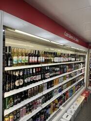 Bargain Beers off licence and convenience store for sale in middle of Warrington