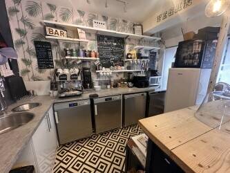 Thriving Café, Retail & Salon Space with Multiple Income Streams Photo 1