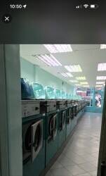 Well established laundrette business with two self-contained flats