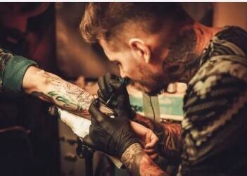 Never Say Die - Tattoo Studio Croydon · Award Winning Tattoo Studio