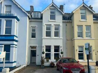 A Stunning Turn-Key Six-Bedroom Guest House A Stunning Turn-Key Six-Bedroom Guest House