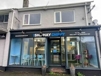 A successful Fish & Chip shop with accommodation for sale
