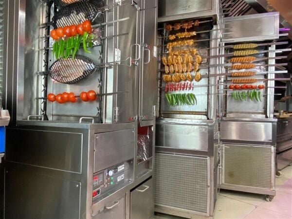AUTOMATED GRILLING SYSTEM WITH OIL-WASTE RECOVERY TECHNOLOGY