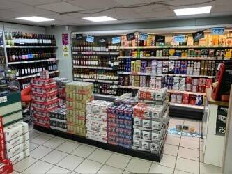 Tameside Costcutter with huge potential next to school, college, hospital in busy residential area. Photo 1