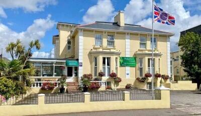 Profitable 15-Bedroom En-Suite Hotel Near Beach & Town Centre Profitable 15-Bedroom En-Suite Hotel Near Beach & Town Centre