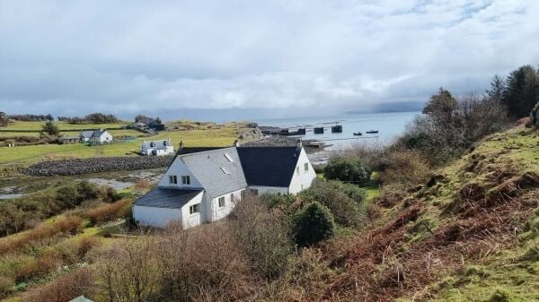 Island retreat with superb harbour views and potential