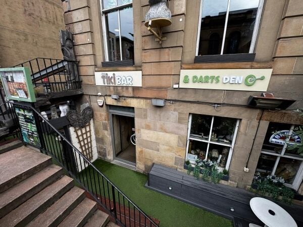 Tiki Bar & Darts Den for sale in Glasgow City Centre with cocktails, Thai cuisine, and darts.