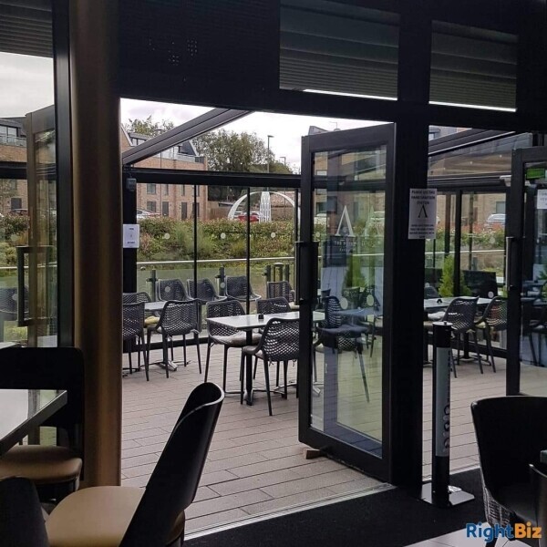 Thriving turnkey business in a stunning state of the art complex with other restaurants Photo 10