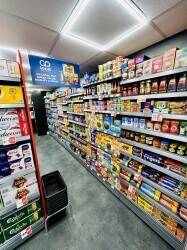 Symbol Fascia Convenience Store Opposite Busy Football Stadium Photo 10