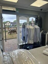 Dry Cleaning receivers and laundry services. High turnover, beautiful location Photo 11