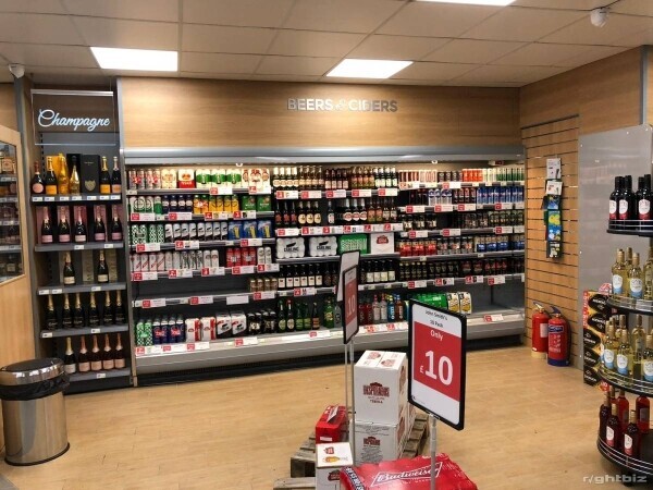 Long established thriving off licence and convenience store in a VERY busy shopping parade. Photo 12