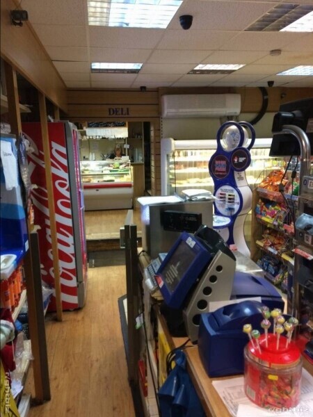 Vibrant Village Store with Post Office, Lottery, Deli, Hot and Cold Food Take-away. Photo 2