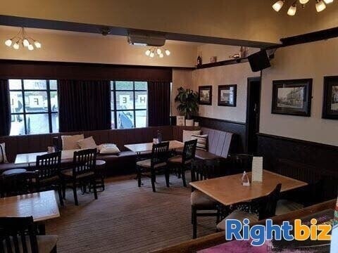 A WELL-PRESENTED PUBLIC HOUSE IN A POPULAR RESIDENTIAL AREA Photo 2