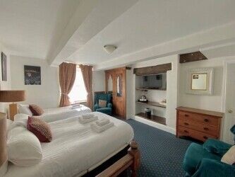 TWO RETAIL UNITS WITH EIGHT GUEST BEDROOMS FOR SALE, LLANGOLLEN, NORTH WALES. Photo 2