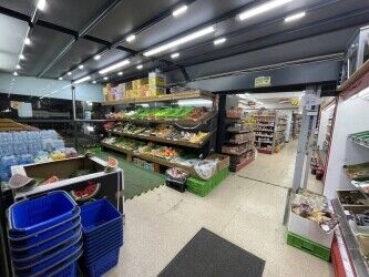 Off license, international foods, halal butchers. Photo 2