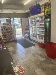 Big off-license convenience store with butchers