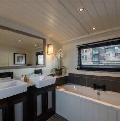 Luxury Wide Beam barge for sale in the exclusive Lime House Marina in London Luxury Wide Beam barge for sale in the exclusive Lime House Marina in London