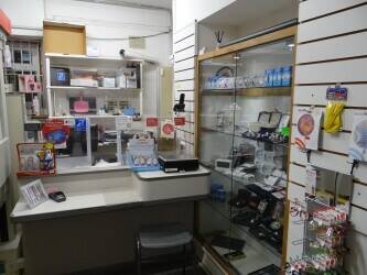 Mains Freehold Post Office with various rental income streams Photo 2