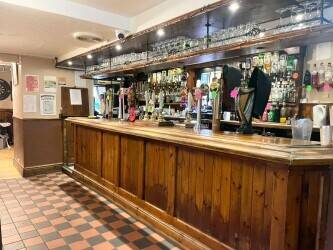 DERBYSHIRE - COMMUNITY PUB WITH LARGE CAR PARK AND TWO FLATS