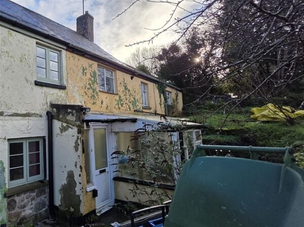 Auction Lot: Renovation-Ready 3-Bedroom Cottage plus Development Land For Sale in Newton Abbot