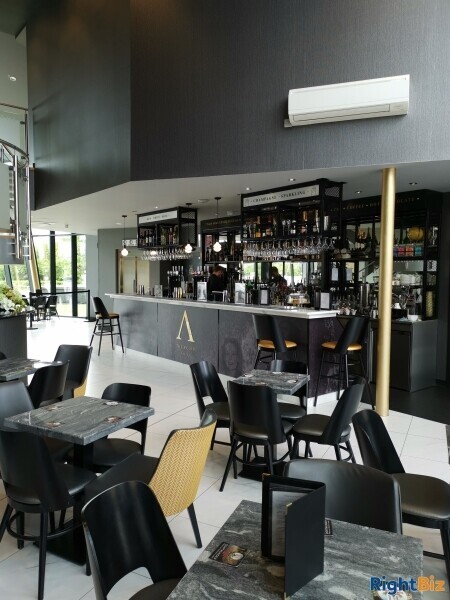 Thriving turnkey business in a stunning state of the art complex with other restaurants Photo 4