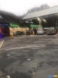 LH Rare Corner retail unit in busy petrol station on the edge of Chichester