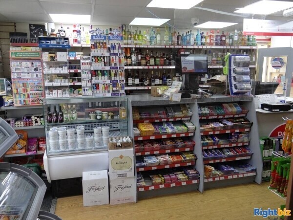 Busy Conv Store and PO Local with large Home Photo 3