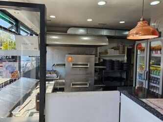 Pizza shop & Chinese takeaway with high turnover & flat above