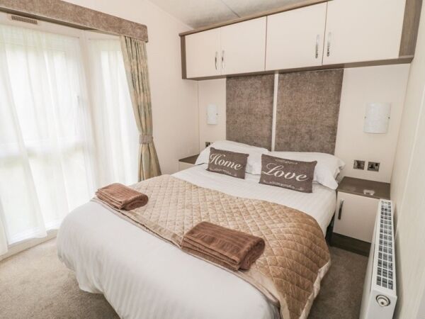 Twin Holiday Lodges For Sale Photo 3