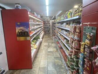 Big off-license convenience store with butchers