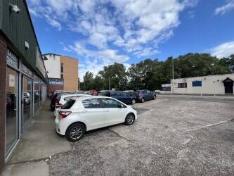 Car showroom with forecourt for c.35 vehicles located just 15 minutes west of Edinburgh city centre.