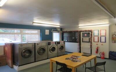 Excellent Freehold Property, currently trading as a laundrette business Photo 3