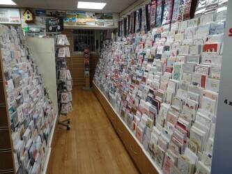 Mains Freehold Post Office with various rental income streams Photo 3