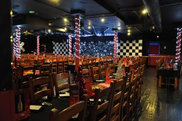 OPERATES THREE LARGE CAPACITY LIVE MUSIC RESTAURANTS