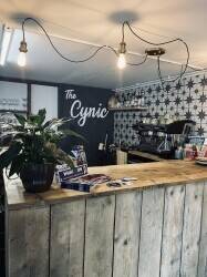 Unique Coffee shop/barber/tattoo room Photo 1