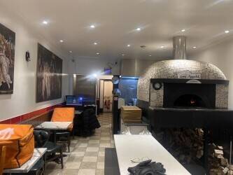 Italian pizza restaurant with wood-fired oven
