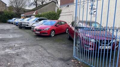 Established Car sales and repair dealership with flats.With planning permission to build on