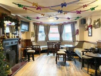 DERBYSHIRE - COMMUNITY PUB WITH LARGE CAR PARK AND TWO FLATS