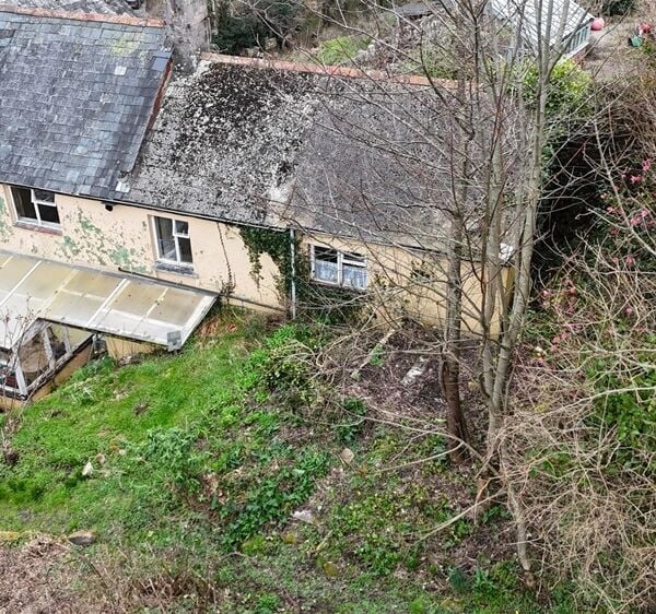 Auction Lot: Renovation-Ready 3-Bedroom Cottage plus Development Land For Sale in Newton Abbot