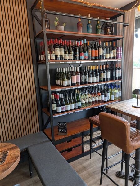 INDEPENDENT TAPROOM, WINE BAR, AND SHOP INDEPENDENT TAPROOM, WINE BAR, AND SHOP
