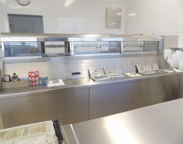 Staff-run fish & chip shop, affluent north Leeds suburb Staff-run fish & chip shop, affluent north Leeds suburb