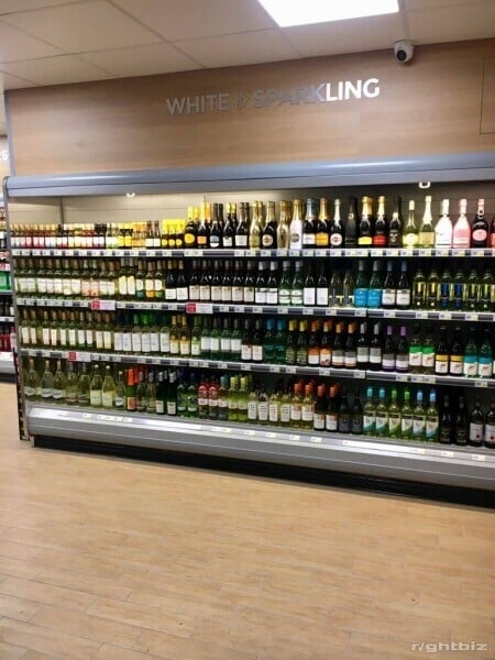 Long established thriving off licence and convenience store in a VERY busy shopping parade. Photo 5