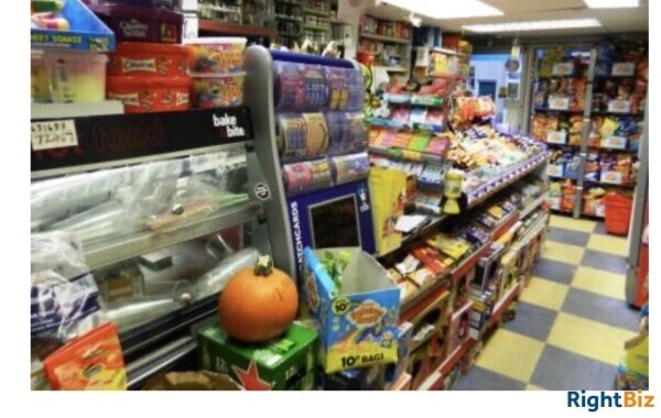 SUPERB CONVENIENCE STORE / OFF LICENCE / NEWSAGENTS WITH LARGE THREE BEDROOM FLAT NO COMPETITION Photo 5