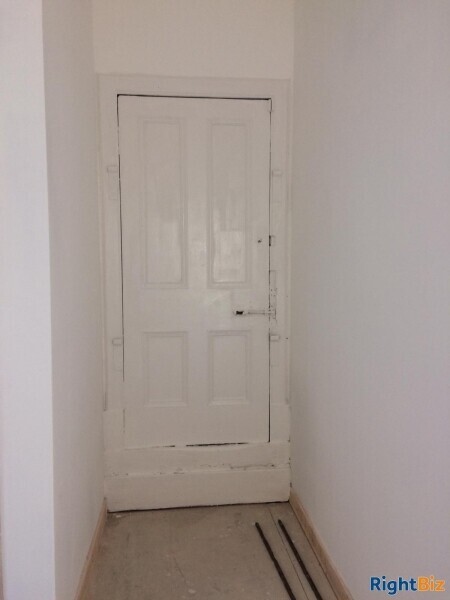 Newly refurbished shop shell unit, prime high street location with parking outside Photo 4
