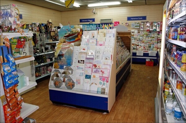 Newsagents with unexploited Off-Licence, amidst affluent residential suburb, outskirts of Poole. Photo 4