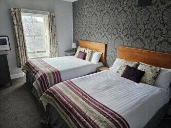 The County Hotel occupies a prominent location on the High Street of the historical town of Selkirk. Photo 4