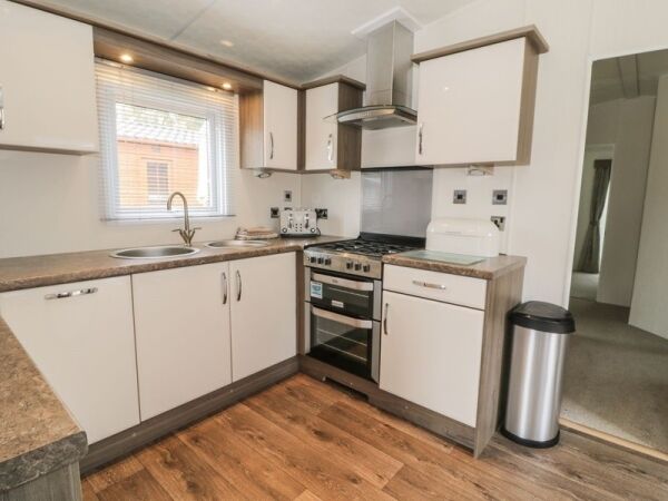 Twin Holiday Lodges For Sale Photo 4